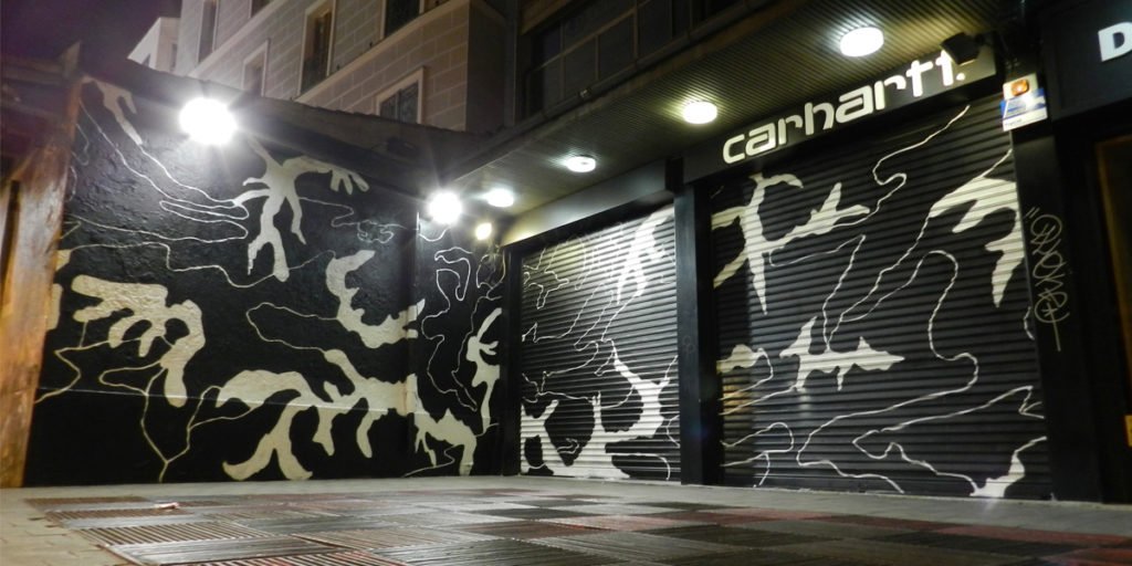 Graffiti-en-cierres-de-Carhartt-Madrid Graffiti en cierres y fachada de Carhartt en Madrid