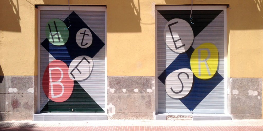 Graffiti-en-persiana-de-local-de-Madrid Graffiti en persiana de local de Madrid