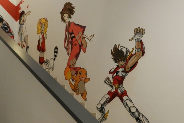 Graffiti-charmander-en-oficina Graffiti de Saint Seiya en Madrid