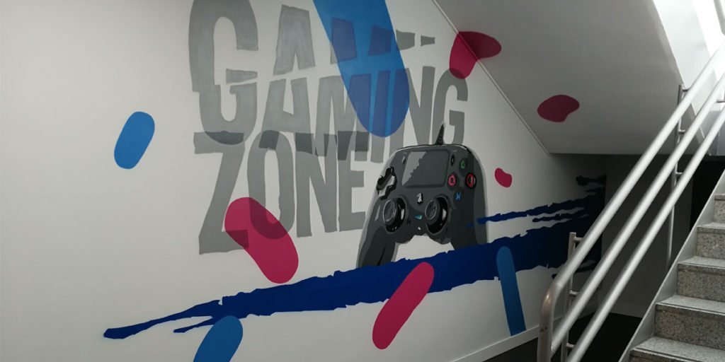 Graffiti en Zona Gaming de oficina de Madrid