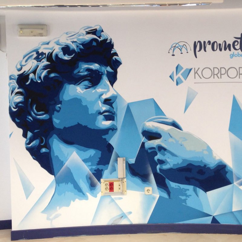 Graffiti en recepción de oficina en Ciudad Real