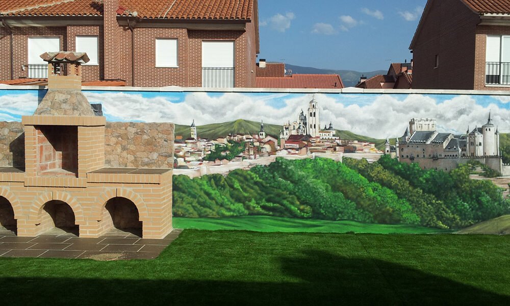 Mural-de-segovia-en-jardin Graffiti mural de Segovia en jardín con barbacoa