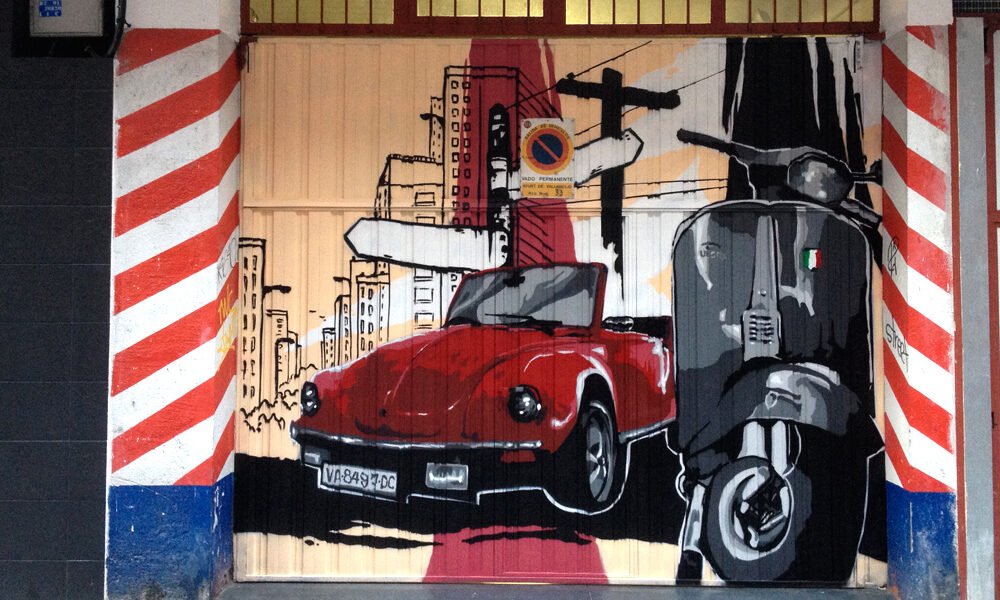 graffiti-coche-y-moto-en-puerta-de-garaje Graffiti de coche y moto en puerta de garaje