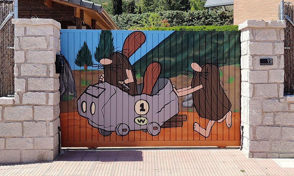 graffiti-de-los-autos-locos-en-puerta-de-garaje Graffiti de los autos locos en puerta de Madrid