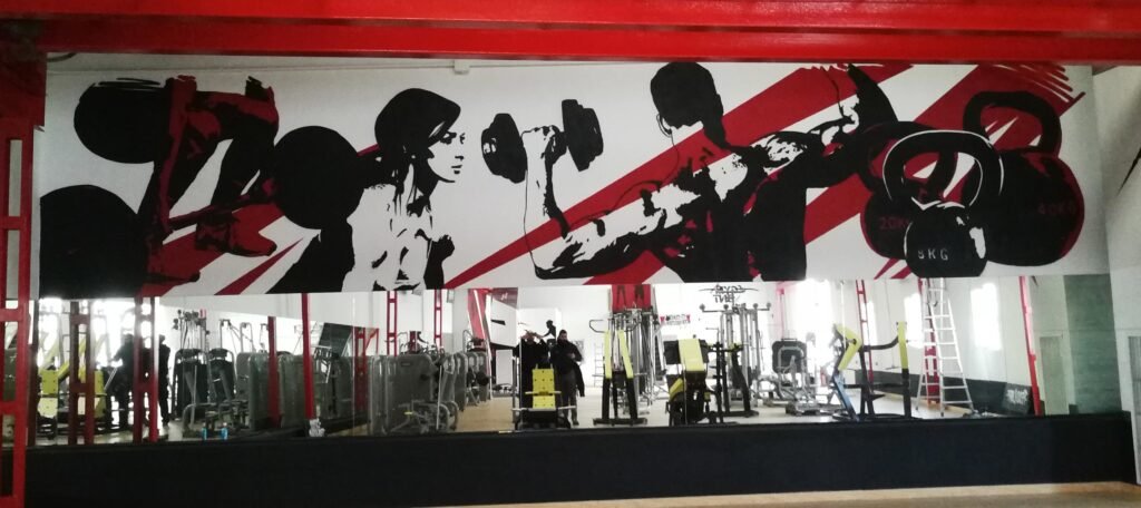 Graffiti profesional en gimnasio de Madrid