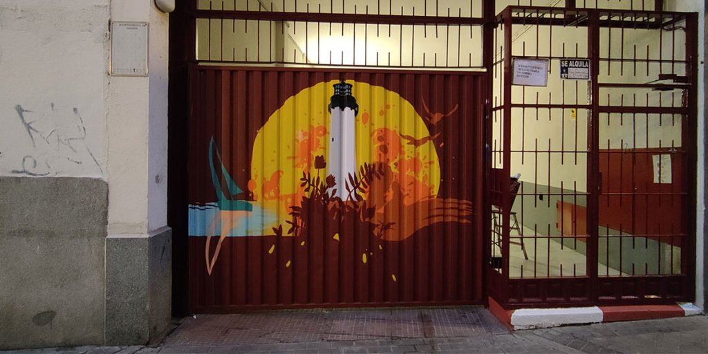 puerta-de-garaje-en-madrid-con-graffiti Decoración con graffiti en puerta de garaje