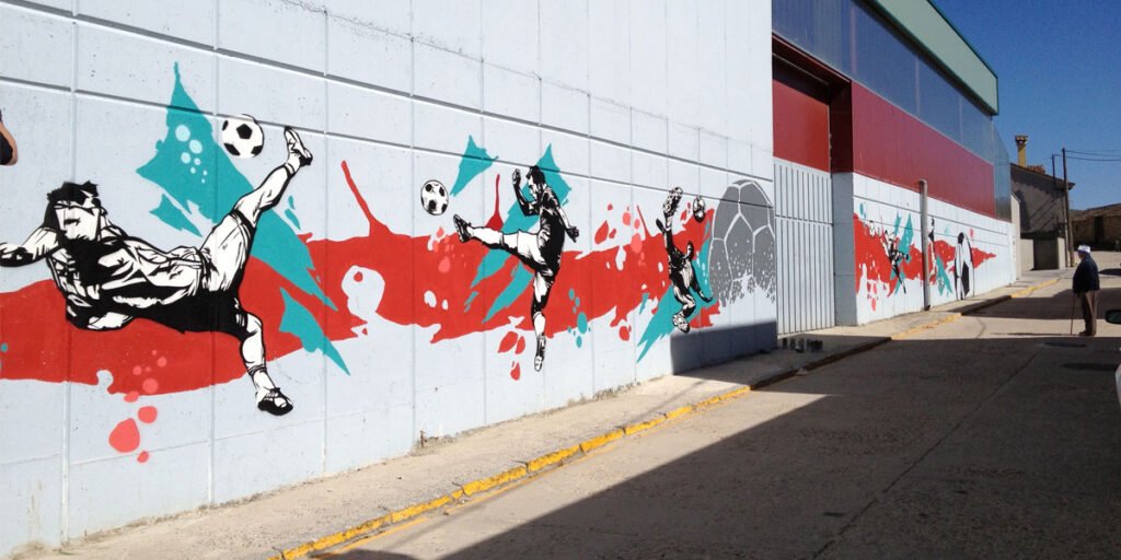 graffiti-mural-en-fachada-de-polideportivo Graffiti mural en fachada de polideportivo