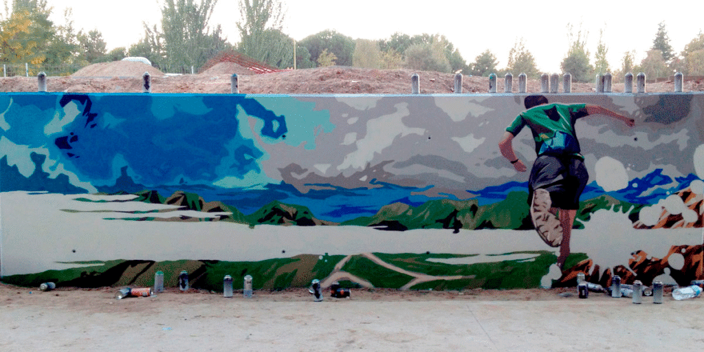 Graffiti profesional de runner en Madrid Río
